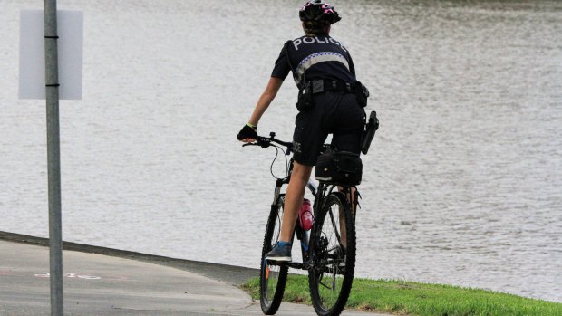 Police search for rower who went missing in the Brisbane River.