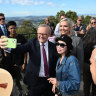 Prime Minister Anthony Albanese and Rebecca Hack (in grey) at the Mount Coot-Tha Lookout in Brisbane.