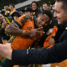 Filippo Daugunu smiles with fans after the Wallabies’ win.