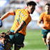 Jordan Petaia of Australia attempts to avoid a tackle.