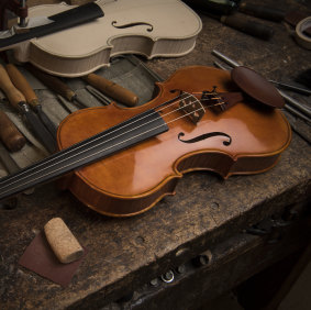 Harry Vatiliotis wants to slow down but will keep making violins from home.