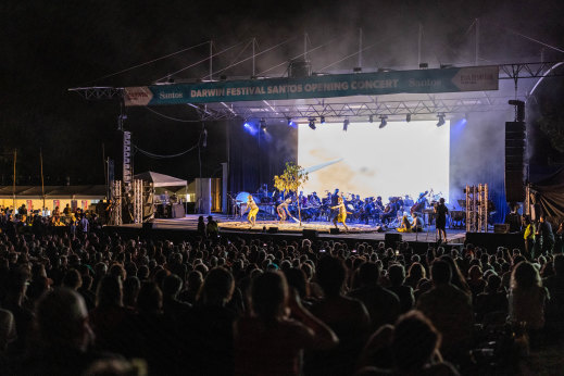 Santos was featured heavily on the banner above the stage on opening night.