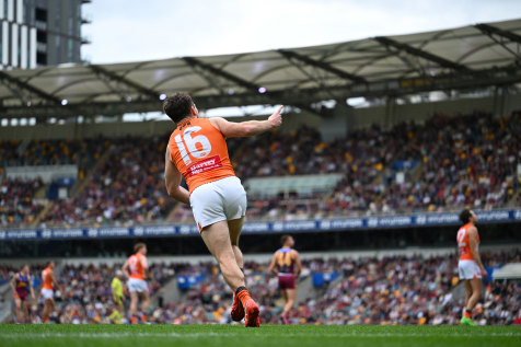 Brent Daniels of the Giants celebrates kicking a goal during the round 22 Gabba clash.