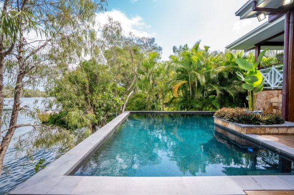 Perched on the Noosa River, this well-appointed fishing lodge has everything you need.