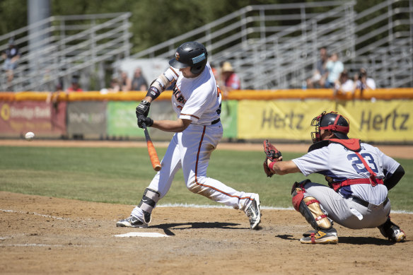 Cavalry first-base Boss Moanaroa swings hard.