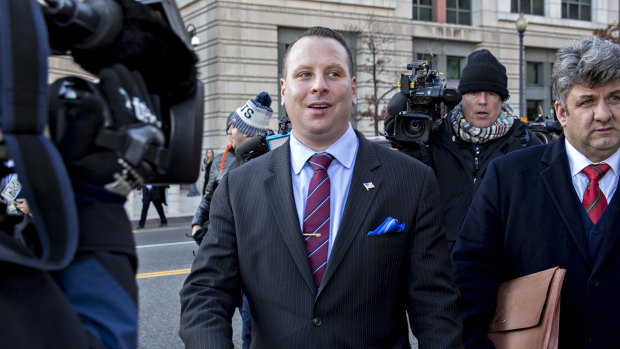Sam Nunberg, former campaign aide for Donald Trump, left, exits federal court in Washington on Friday.