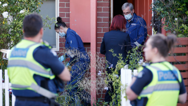 Police at the scene in January after Sarah Gatt's body was found in a bathtub.
