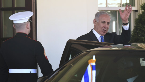 Benjamin Netanyahu waves as he leaves the White House on Monday after meeting with Donald Trump. 