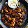 Neil Perry’s southern-style smoky wings with goat’s curd dressing.