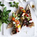 Neil Perry’s bruschetta with cherry tomatoes, basil, olives and feta.