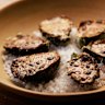 Oysters are baked in the style of rarebit, with a cheesy topping.