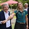 International Olympic Committee President Thomas Bach with BMX Freestyle competitor Natalya Diehm during a visit to Brisbane State High School.