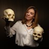  Dr Eline Schotsmans holding a Replica of Neolithic  female human cranium