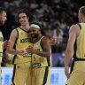 Boomers stars Josh Giddey (3) and Patty Mills (5) share a moment.