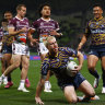 Melbourne’s Cameron Munster celebrates after scoring a try against Manly.