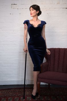 Tara Moss and her walking stick, Wolfie, in 2019.