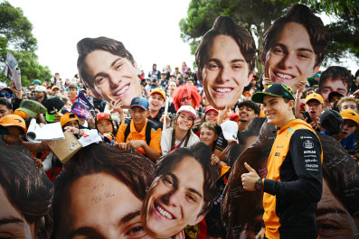 Melbourne race fans show their support for home-town hero Oscar Piastri in 2024.