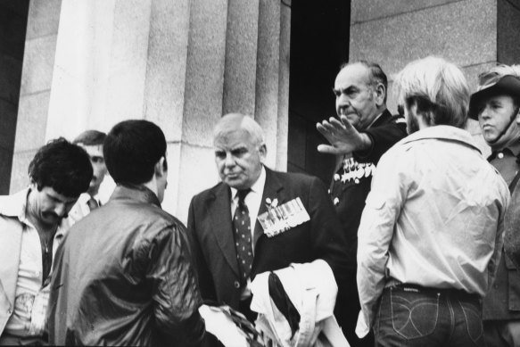 Anzac Day, 1982: Victorian RSL president Bruce Ruxton (centre) confronts  members of the Gay Ex-Servicemen’s Association at the entrance to the Shrine. The group wanted to lay a wreath but they were stopped.
