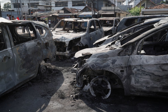 Cars burnt during protests.