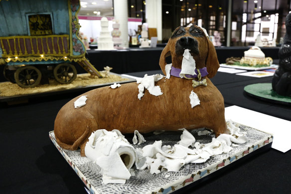 A dog cake is seen on display.