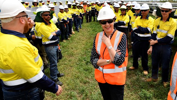 Annastacia Palaszczuk with workers at the Clare Solar Farm project in Ayr.