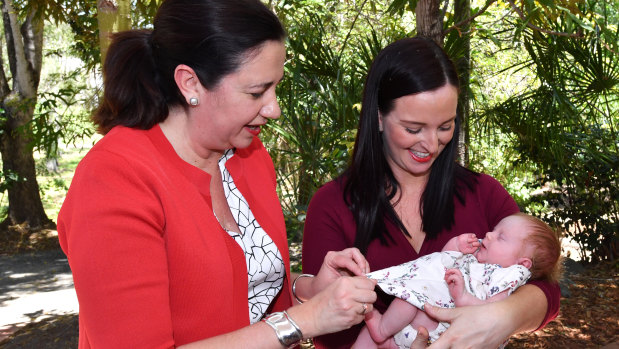 Premier Annastacia Palasaczuk, Brittany Lauga and Odette during the election campaign.