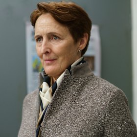 Fiona Shaw is stitched up in tweed as MI6's Carolyn Martens in series one.