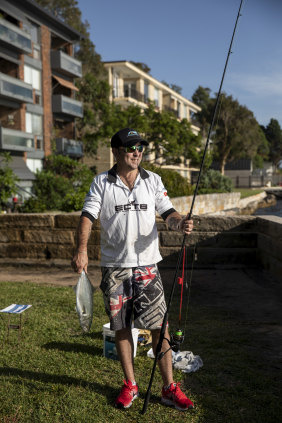Jeremy Sims with a fish he caught at Balmain East.