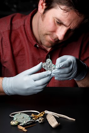 Dr Martin Goldberg with items from the Galloway Hoard.
