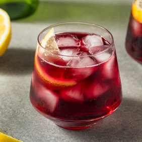 Tinto de verano (red wine of summer) – a combination of red wine, soda and lemon in a big glass of ice.