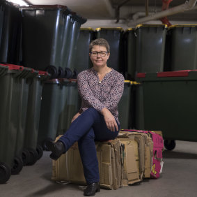 Eco-Concierge of Lendlease Lucy Sharman in the Recycling Plant at Barangaroo South. 
