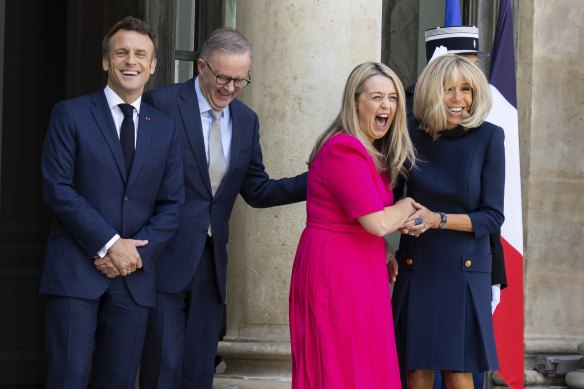 Australian Prime Minister Anthony Albanese and his partner Jodie Haydon are greeted by French President Emmanuel Macron and his wife Brigitte Macron at the Élysée Palace in Paris.