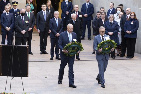 Opposition Leader Peter Dutton and Prime Minister Anthony Albanese lay wreaths during the Last Post ceremony at the War Memorial on Monday.