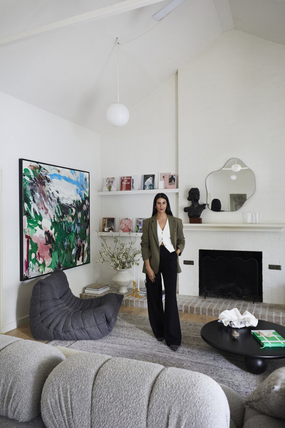 “I describe my style as comfortably minimal,” says Bochnik, pictured in her lounge.  “It’s classic with  a modern edge.”