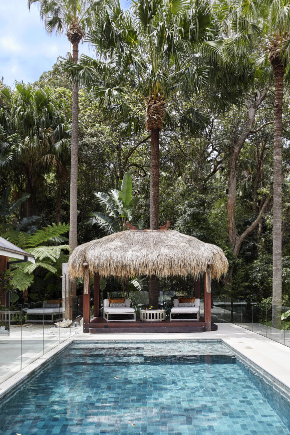 A 10-metre pool lined with Sukabumi tiles is adjacent to the main living area. The handcrafted teak cabana with Island Thatch roof features two day beds.
