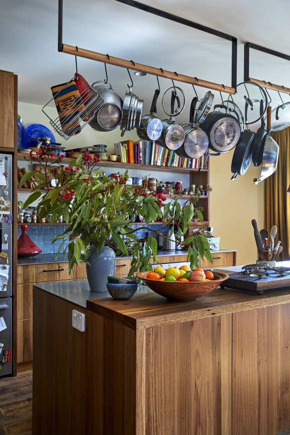 The cook’s kitchen features custom-built hanging racks for pots and pans, open shelves and lots of cookbooks. The cabinetry utilises native blackbutt timbe