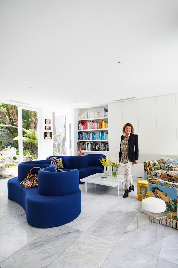 Suzie Stanford in the family lounge. “Our home expresses my love of colour and houses an eclectic collection of things that make me smile.”