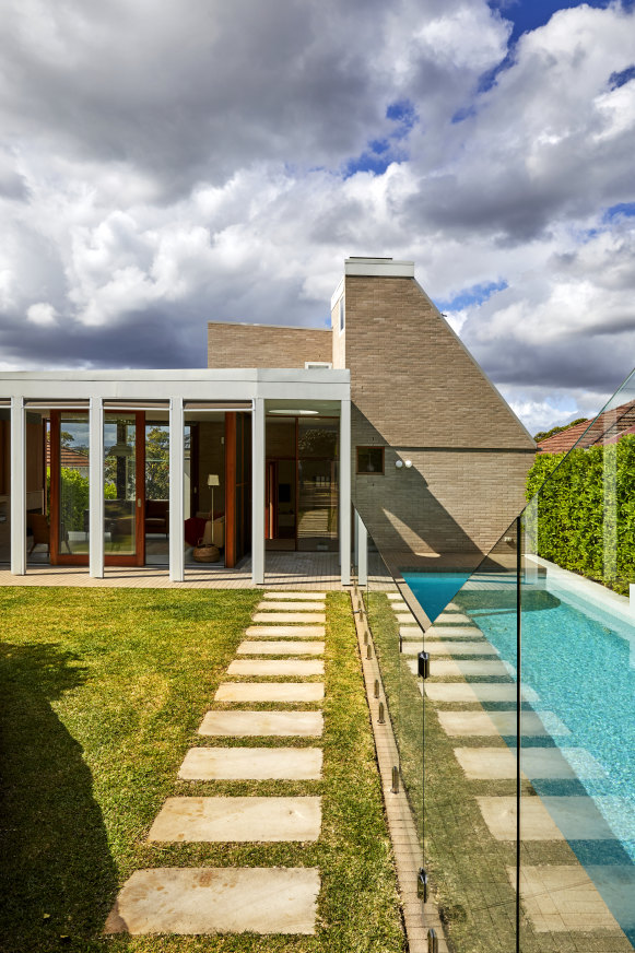 The new wing and second storey, only visible from the rear. The courtyard and structural bricks are the same, giving the effect of a vista of sandstone and clay.