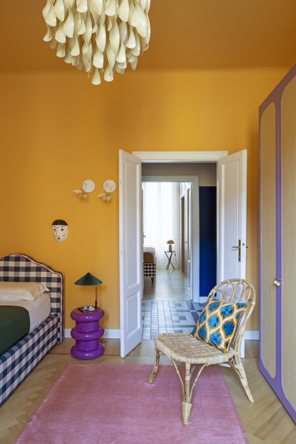 Hay’s “Matin” lamp sits on a stool by Kartell. 