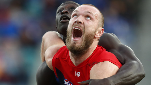 North Melbourne's Majak Daw with Melbourne's Max Gawn.