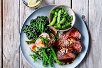 Soy-marinated steak with broccolini and edamame salad.