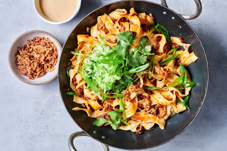 Crispy chilli oil adds its ineffable charm to this peanutty pork and noodle stir-fry.