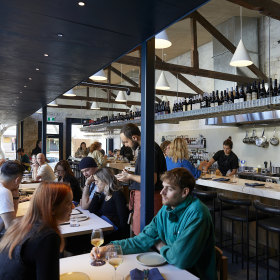 The restaurant is housed in a converted warehouse. 