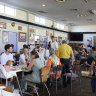 Family pack into the Portuguese dining hall.