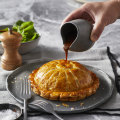 The chimney tube creates the pie’s signature “gravy hole” for serving.