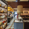 The soft-lit dining room at Restaurant Santino.