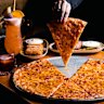 Pizza Pizza Pizza does slices late into the night.