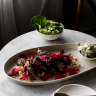 Quail with cous cous, rose petals and cucumber salad.