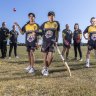 Players from Weribee Junior Cricket Club and Werribee Masters  Football Club at the future Alfred Road Reserve.