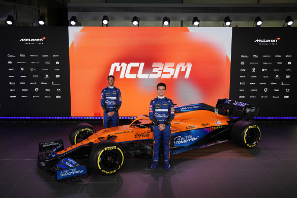 Daniel Ricciardo, left, and teammate Lando Norris, right, at the McLaren F1 car launch. 